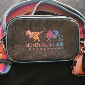 Midsize Coach multi color cross body purse